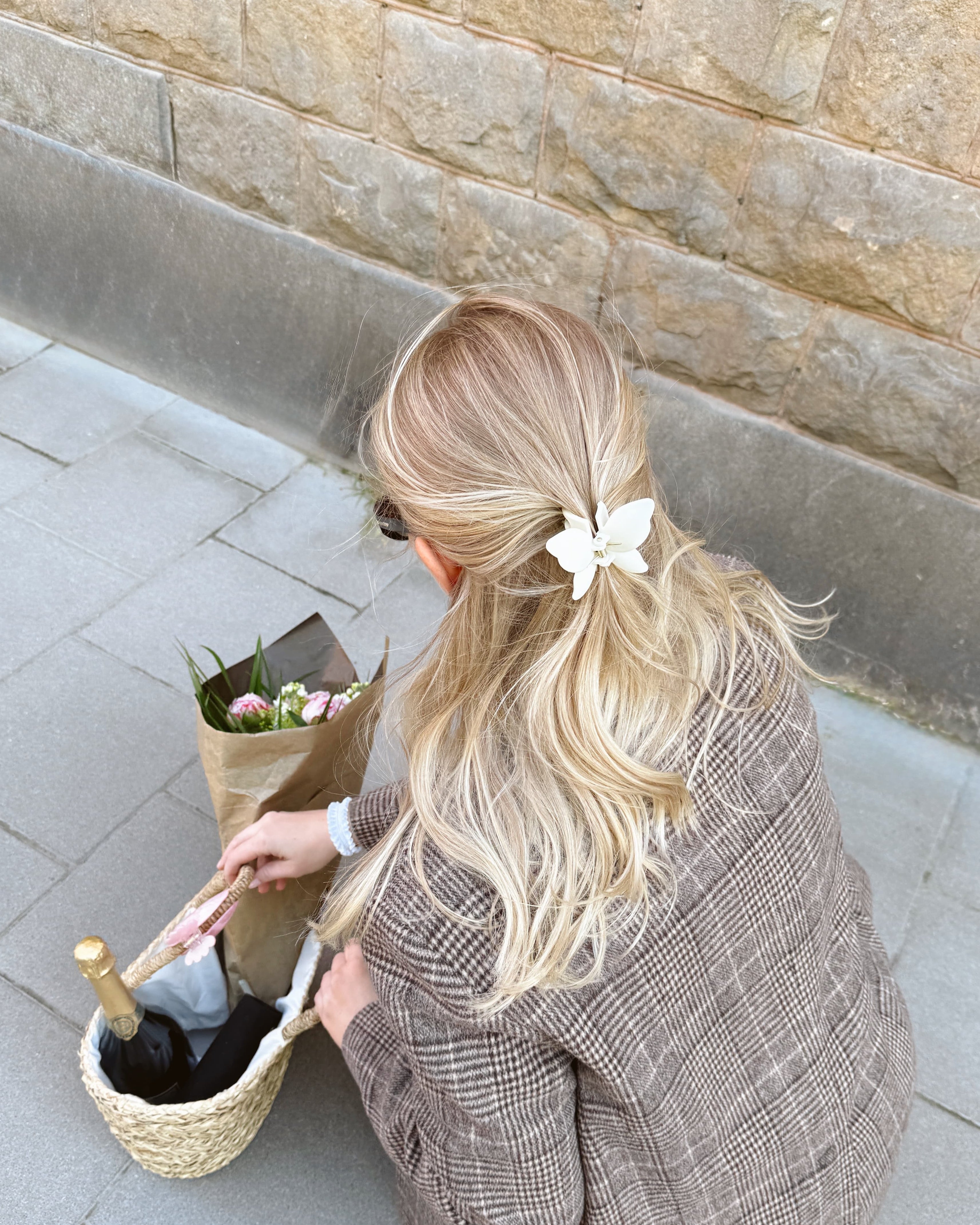 Vit hårklämma fjäril